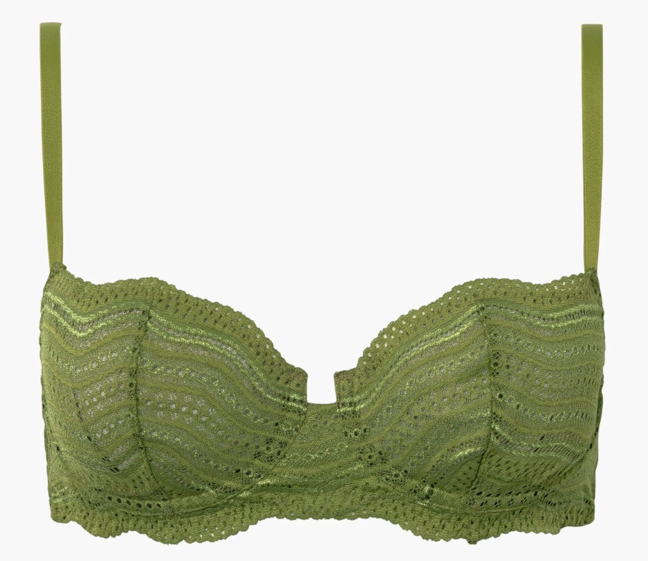 Green lace bra on a white background