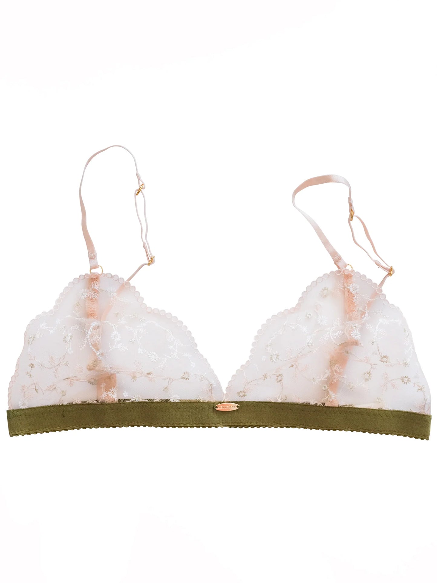 White bra with green band on a white background