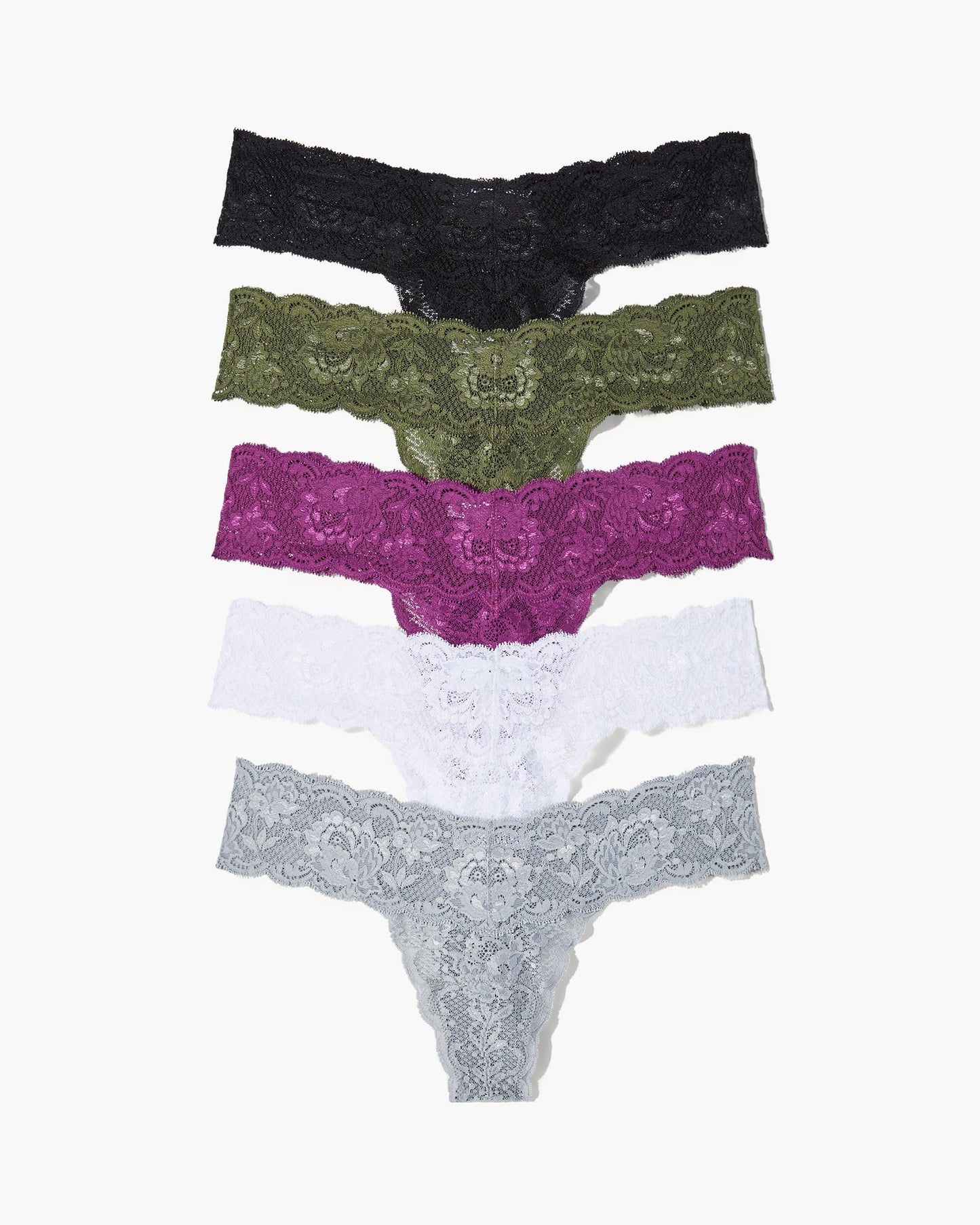 Set of four lace-patterned panties in black, green, purple, and white on a white background.