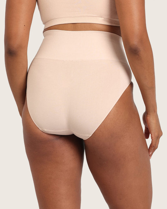 Beige high-waisted bikini bottom on a plain background