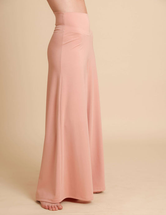 Pink maxi skirt on a beige background