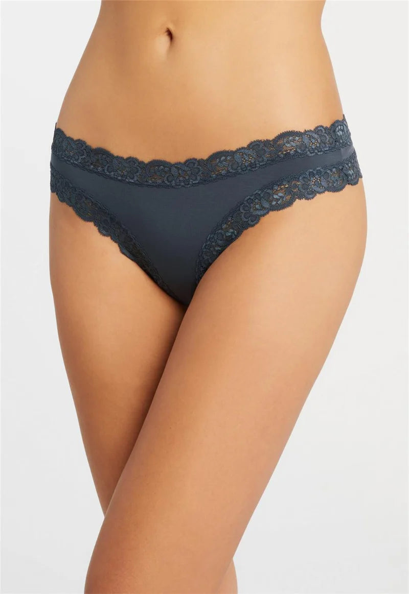 Navy blue lace-trimmed underwear on a white background