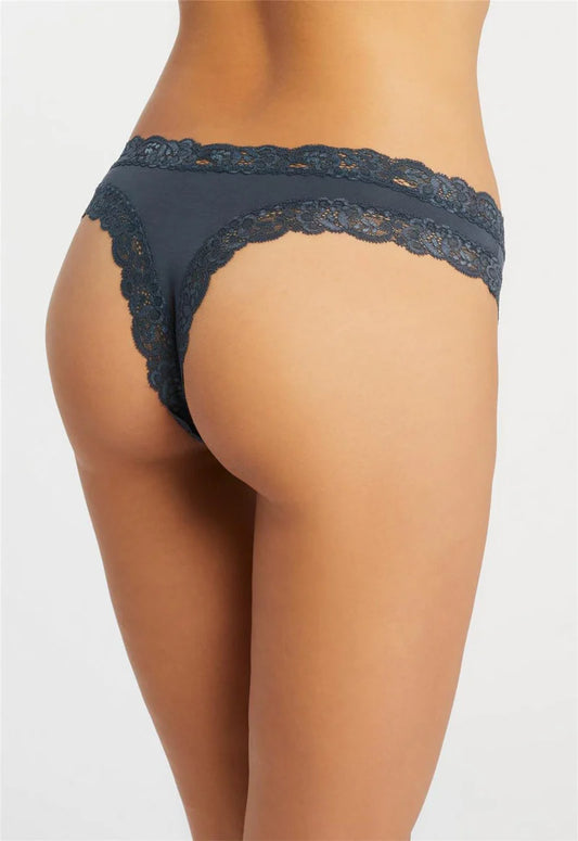 Navy lace underwear on a neutral background