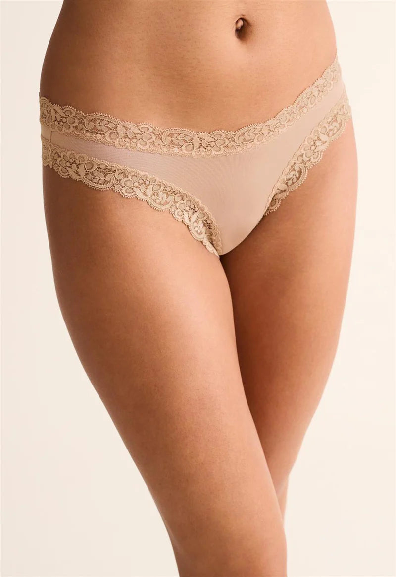 Beige lace underwear on a beige background