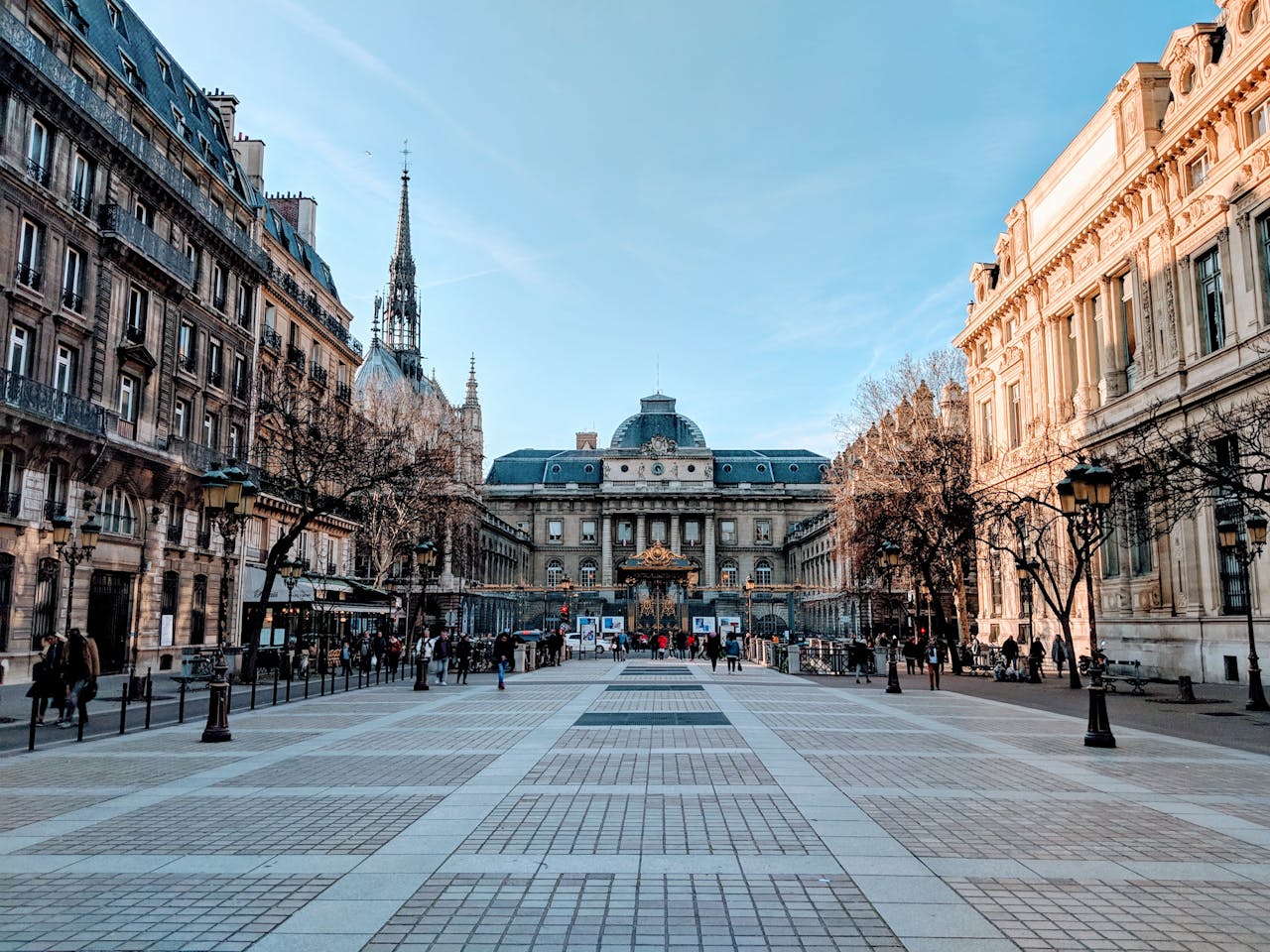 Square with classical architecture buildings and a clear blue sky