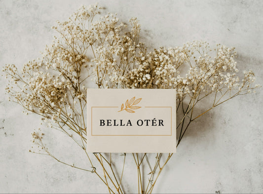 Bella Otér card with dried flowers on a textured surface