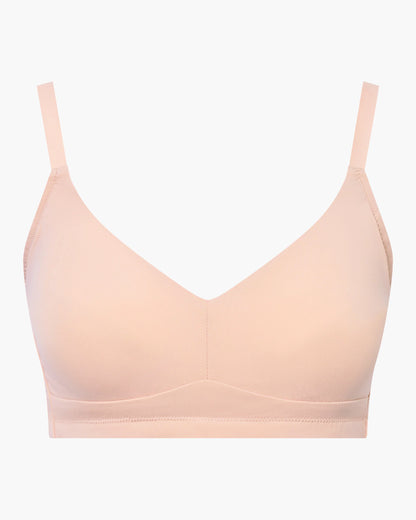 Beige bra on a white background