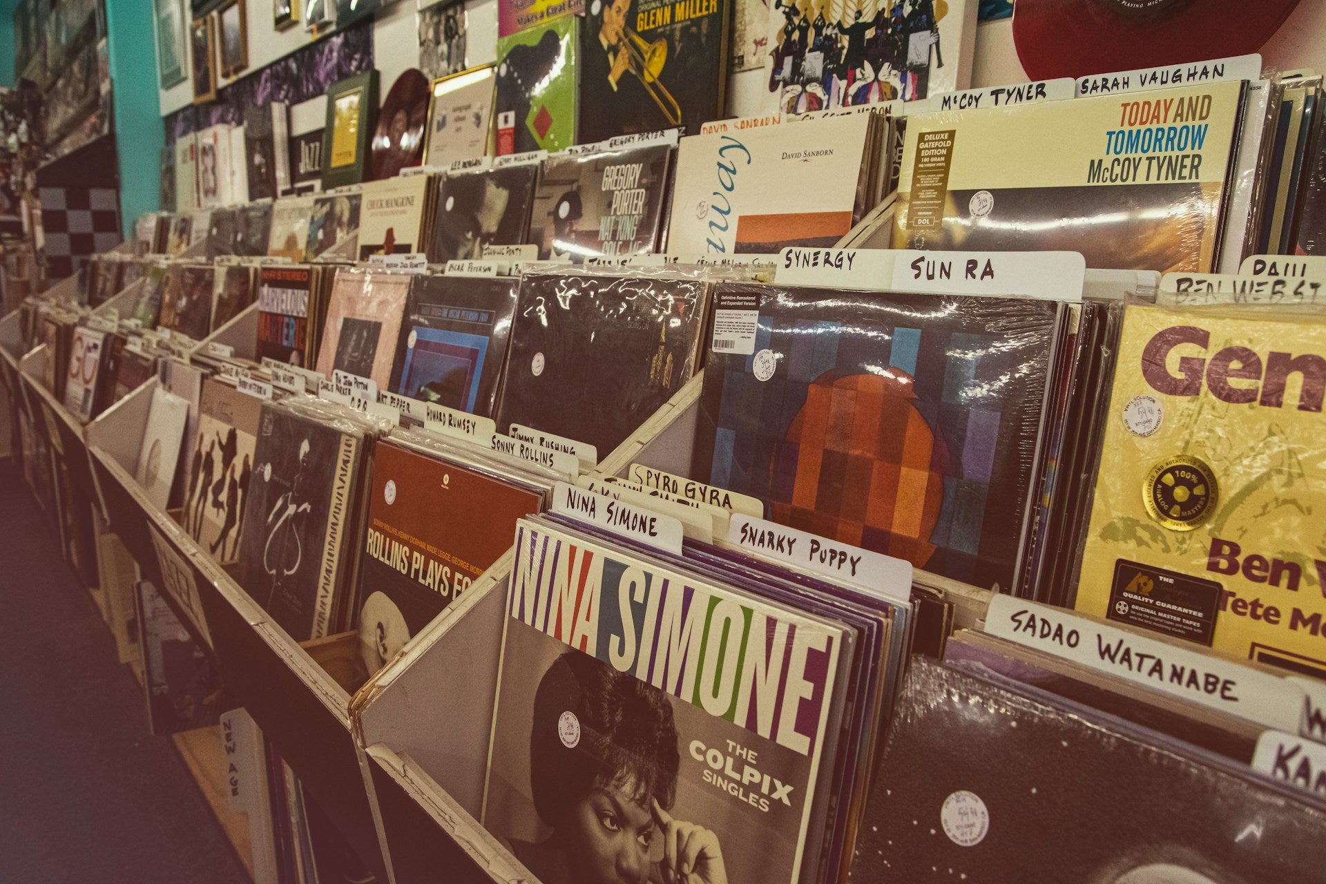 Shelf with various vinyl records in a store