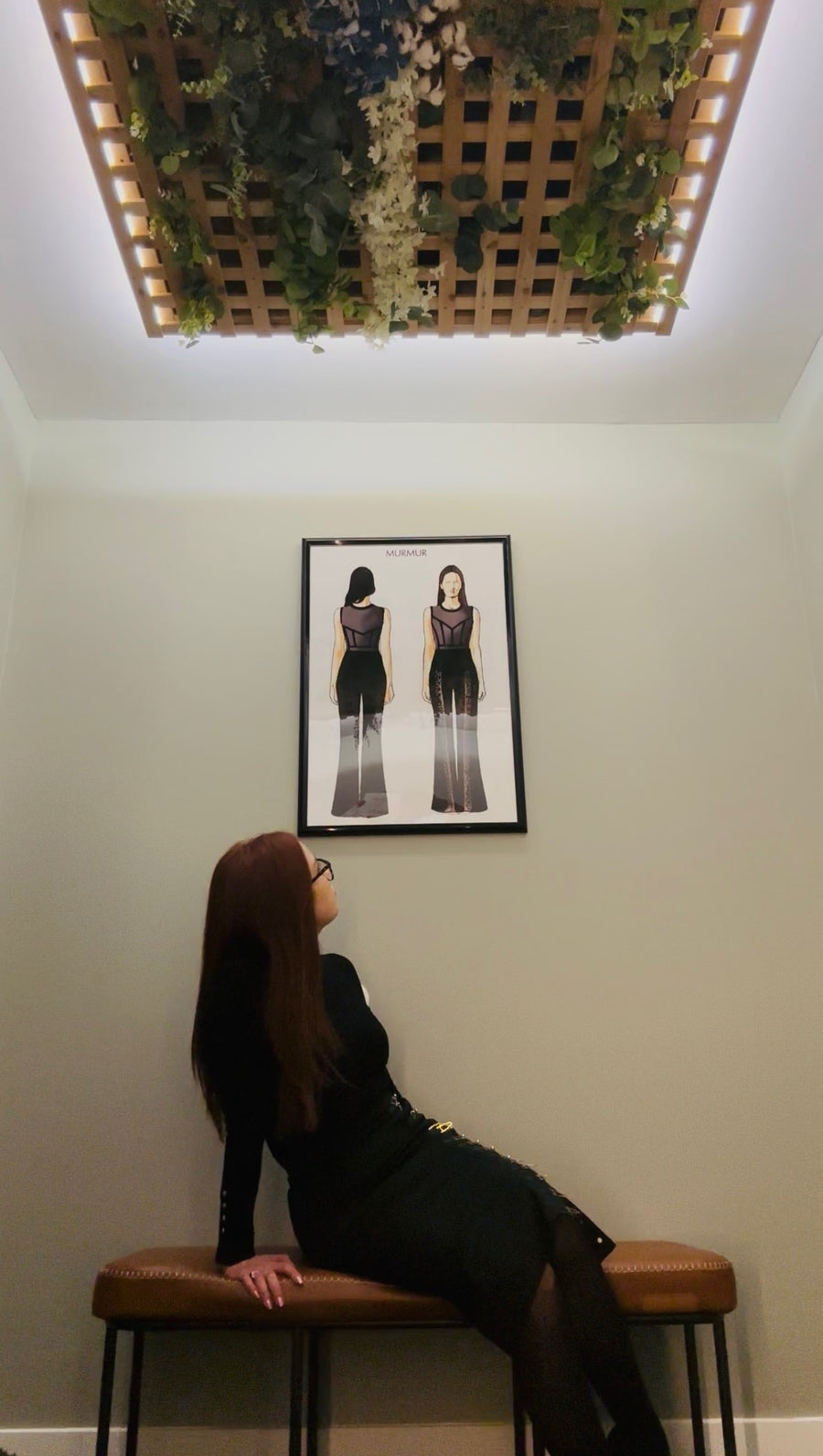 Kim is looking at an image.