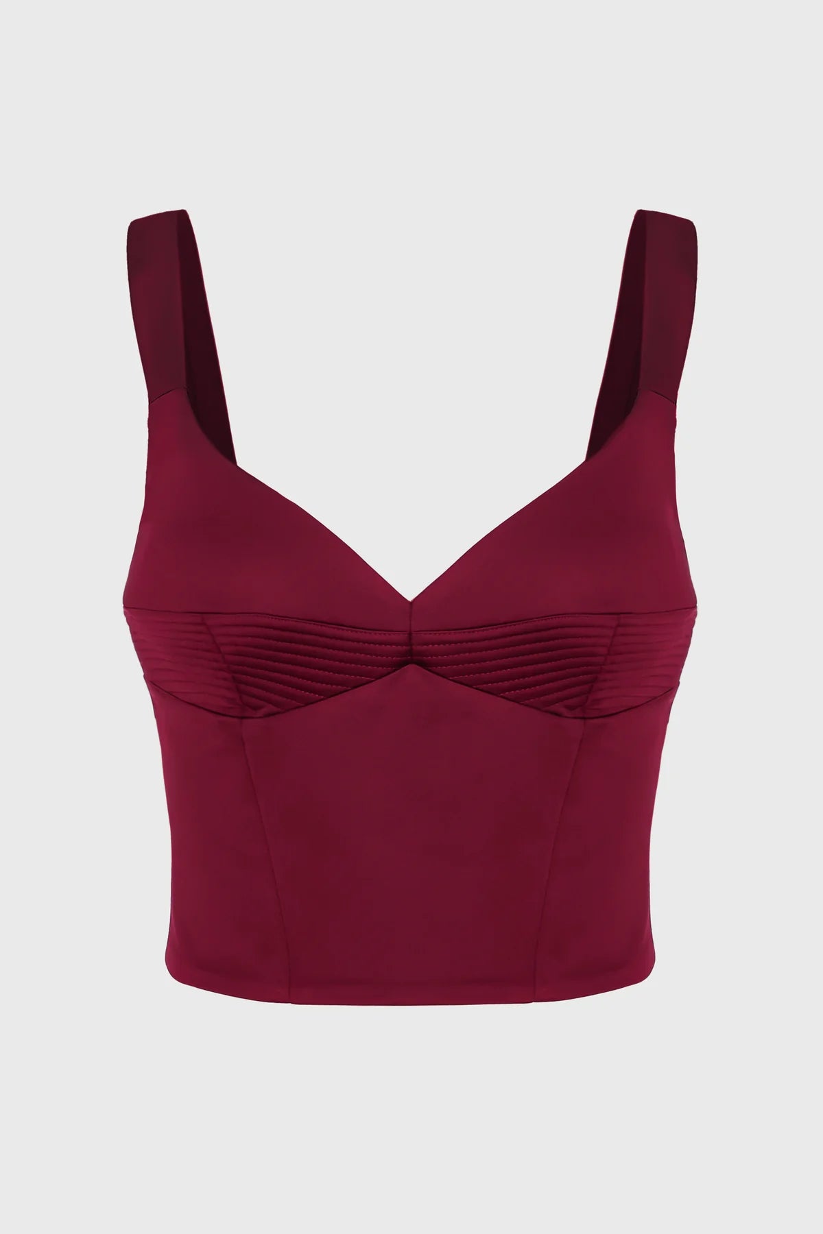 Maroon corset top with thin straps on a light gray background