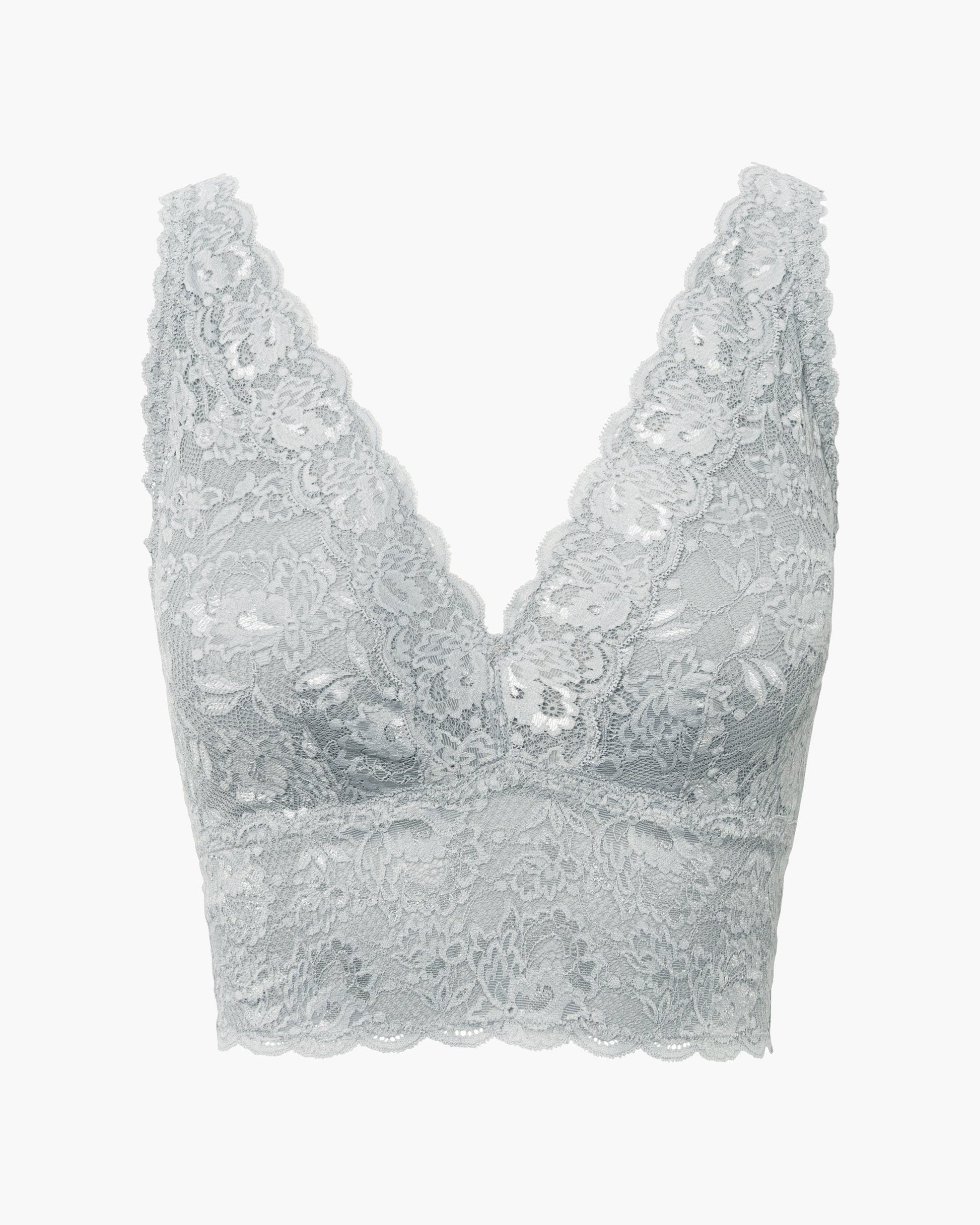 Silver lace bralette on a white background