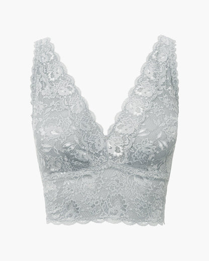Silver lace bralette on a white background