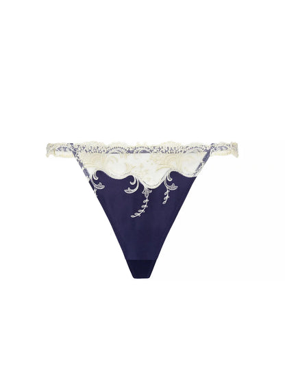 Navy blue bikini bottom with white lace detailing on a white background