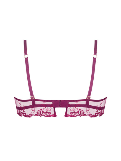 Pink lace bra on a white background