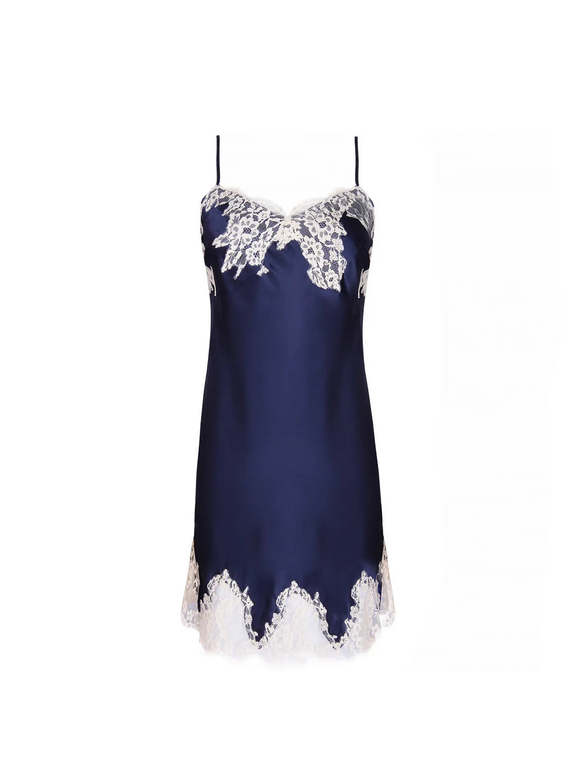 Navy blue slip dress with white lace details on a white background