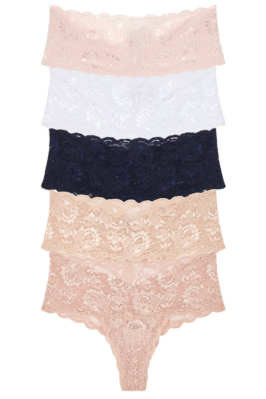 Stack of lace lingerie pieces on a white background