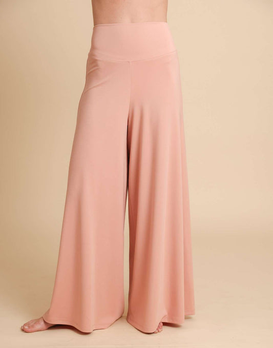 Pink wide-leg pants on a beige background