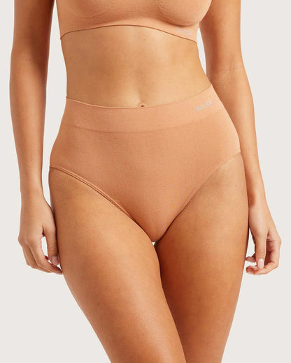 Beige high-waisted underwear on a white background